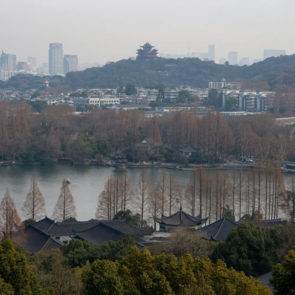 A panoramic view of West Lake and the Hangzhou skyline.